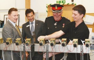 At STG Aerospace, from left, general manager, Gary Lockwood, chief executive Nigel Duncan and Lord Lieutenant Richard Jewson watch process operative, Dan Wall, at work.
