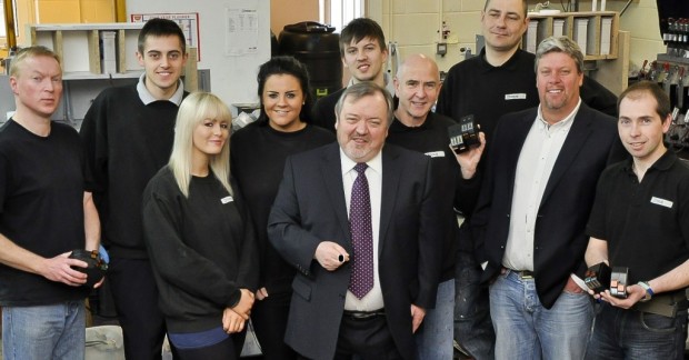 David Hymers with the Totalpost manufacturing team.