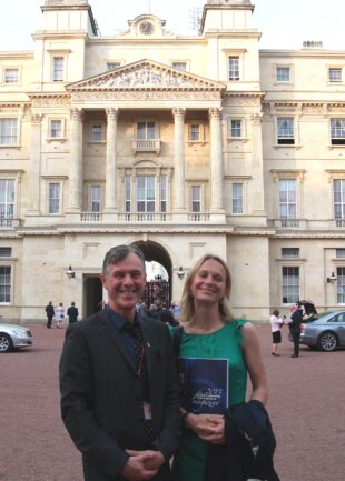 Sean Kelly and Juliet Bernays in front of Buckingham Palace