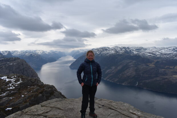 Laura Greenman standing by a fjord in Greenland.
