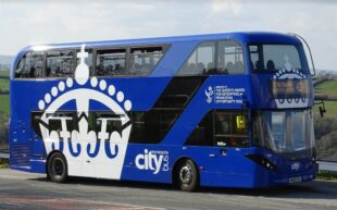 Bus with The Queen's Award emblem